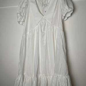 White Puff Sleeve Babydoll Mini Dress